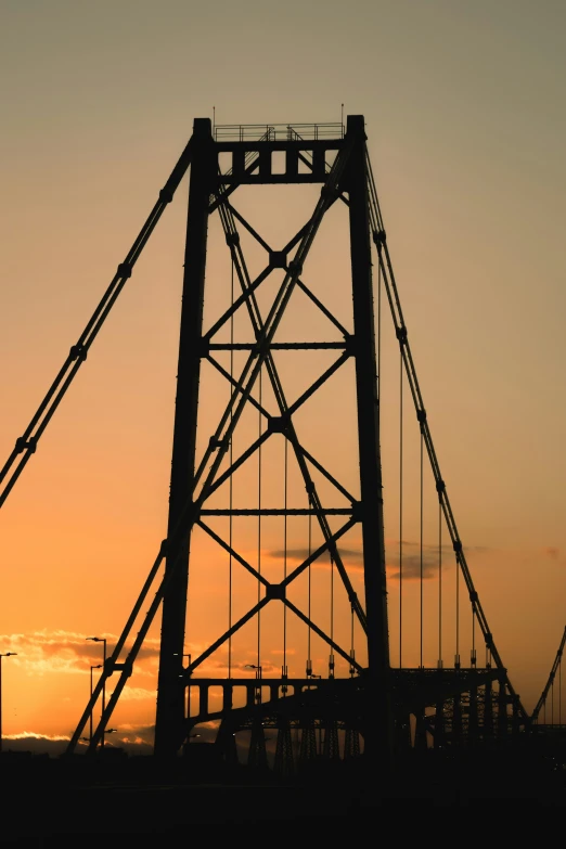 two tall train towers with a sky background