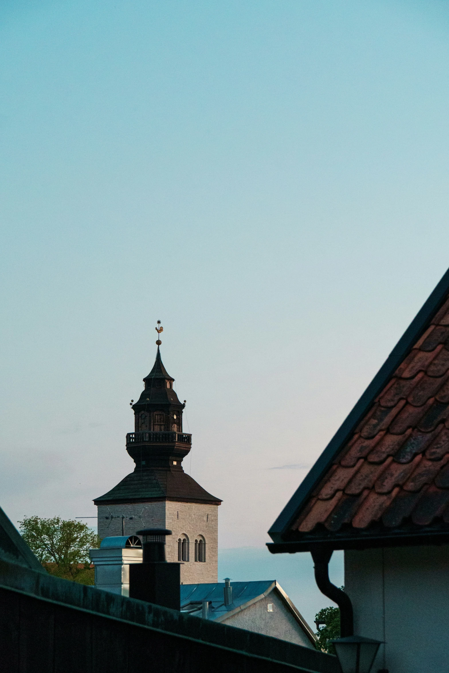 an old building with a steeple with a clock