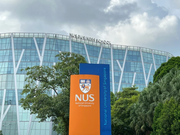 the university logo on the front of a large building