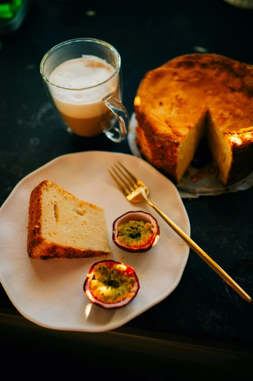 a cake on the table with some other foods around it