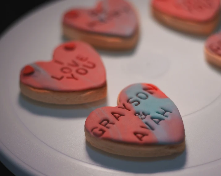 these heart shaped cookies have been decorated with the words love you dad