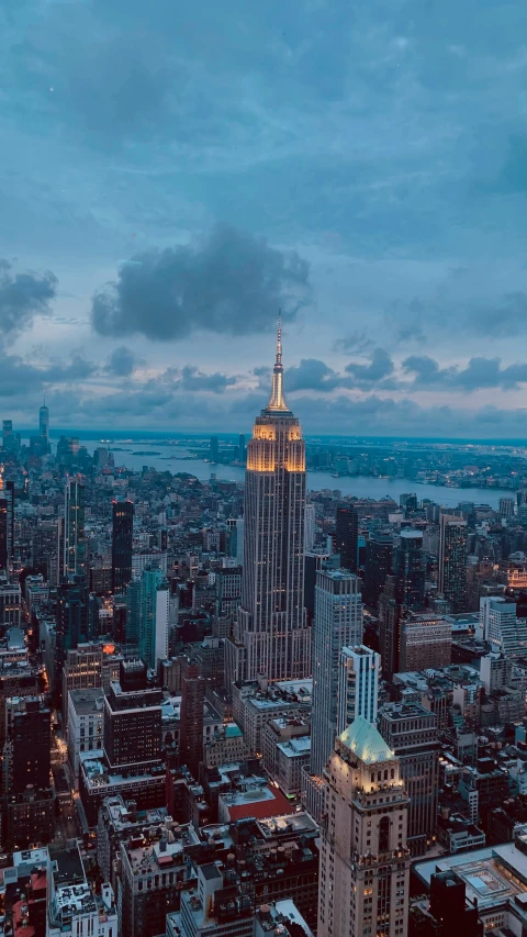 the view of a big city, from above at dusk