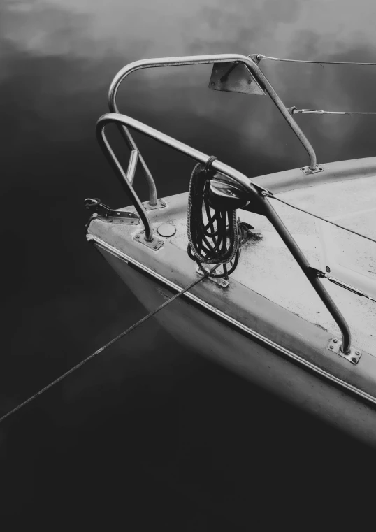 a boat is docked in the water on the dock