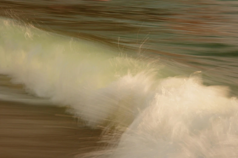 water coming down the side of a wave