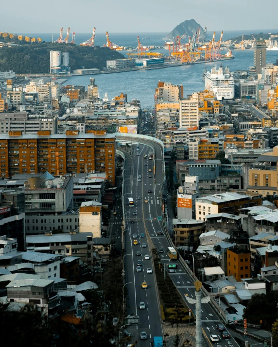 a wide city with a few buildings on the other side