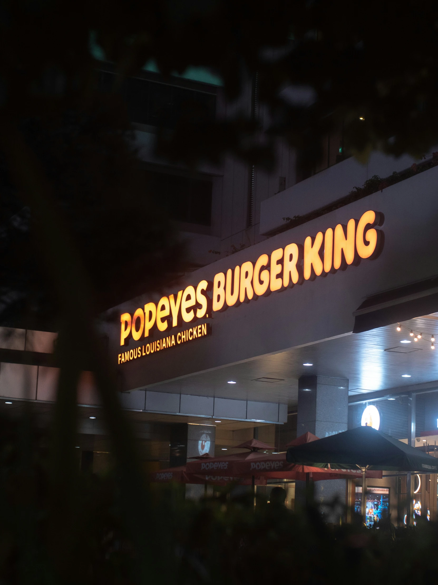 a burger king building that has signage outside it