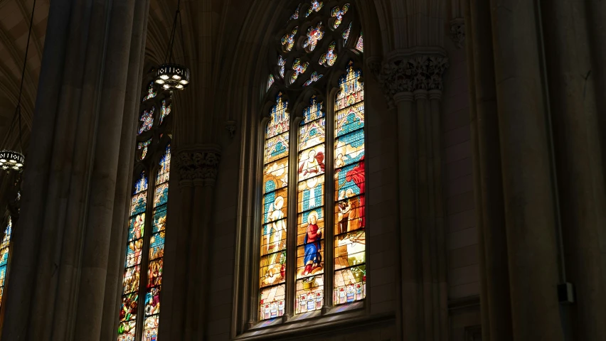 three very nice looking stain glass windows in the church