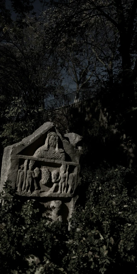 a black and white image of a stone monument