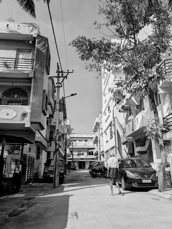 a man is standing in the middle of the road