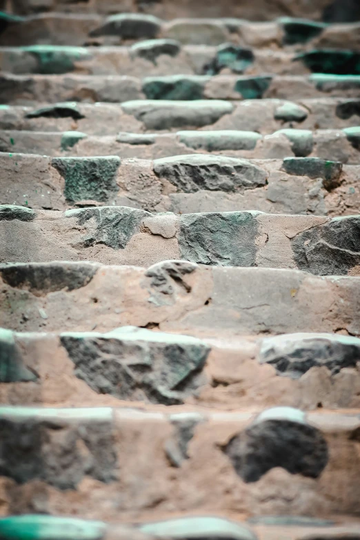 a brick road lined with large rocks