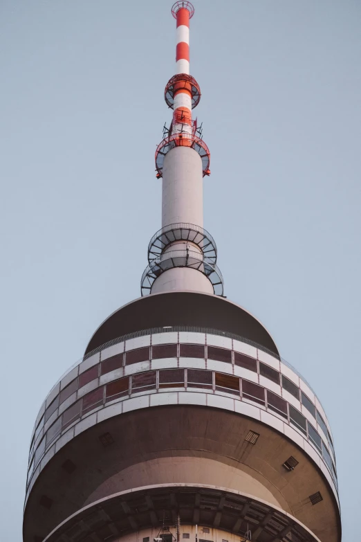 an odd looking building in an area that looks almost cloudy