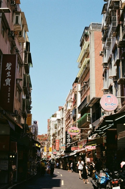 a city street filled with lots of shops