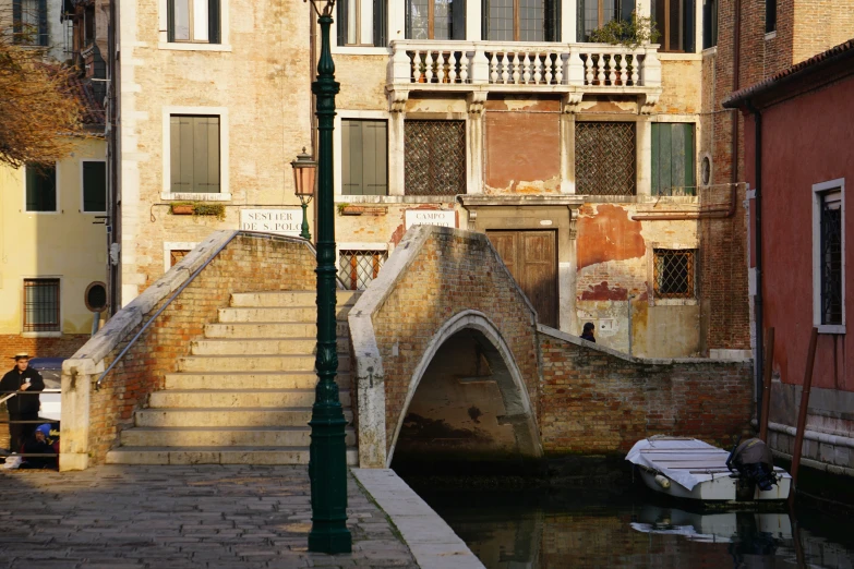 boats in front of buildings on water side