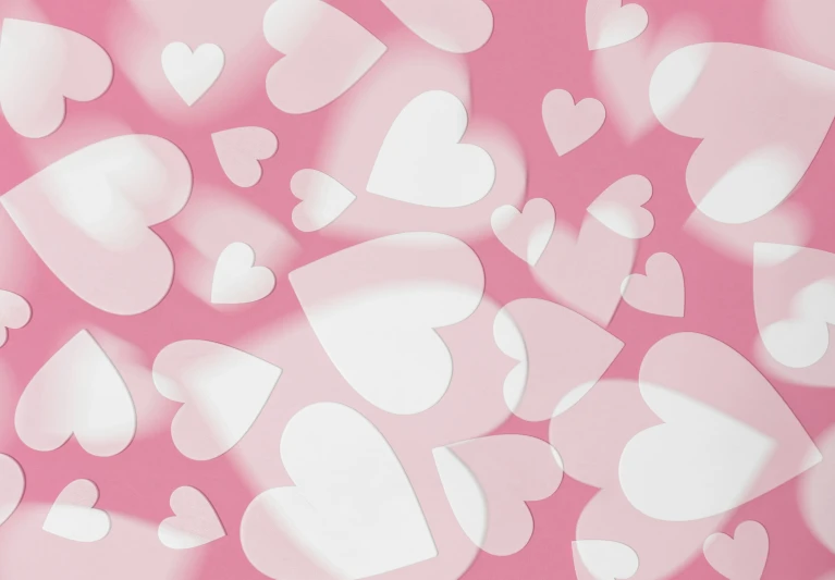 white hearts on pink background pograph