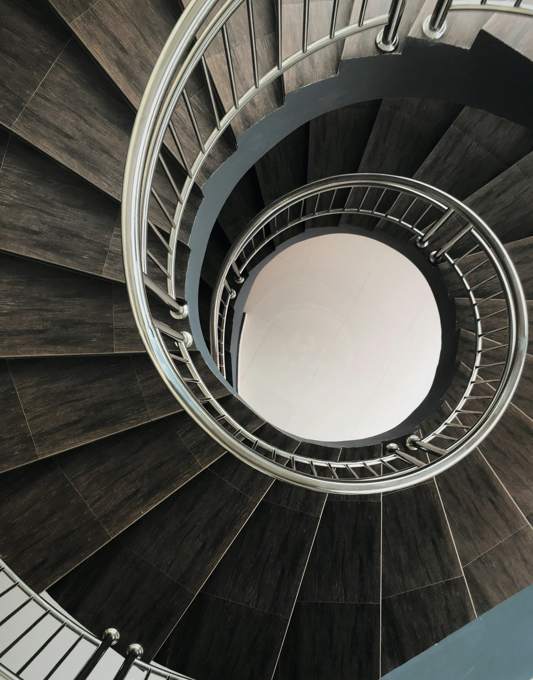 there is a very tall spiral staircase with stairs