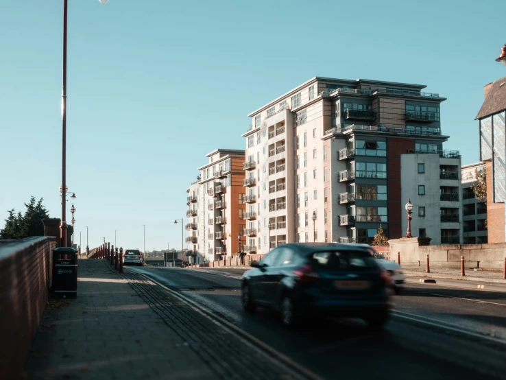 a car is driving on a city street