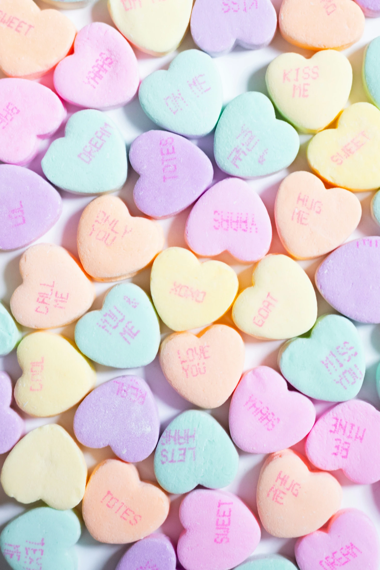 conversation hearts are colorful in size and color