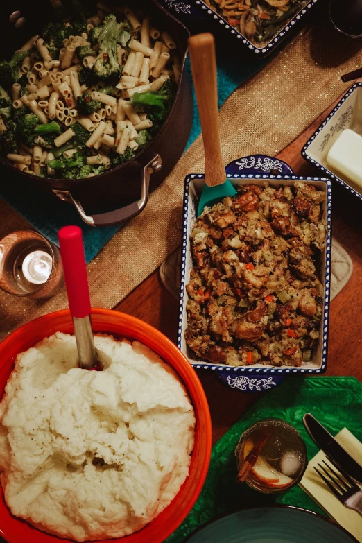 a table filled with dishes, silverware, and plates