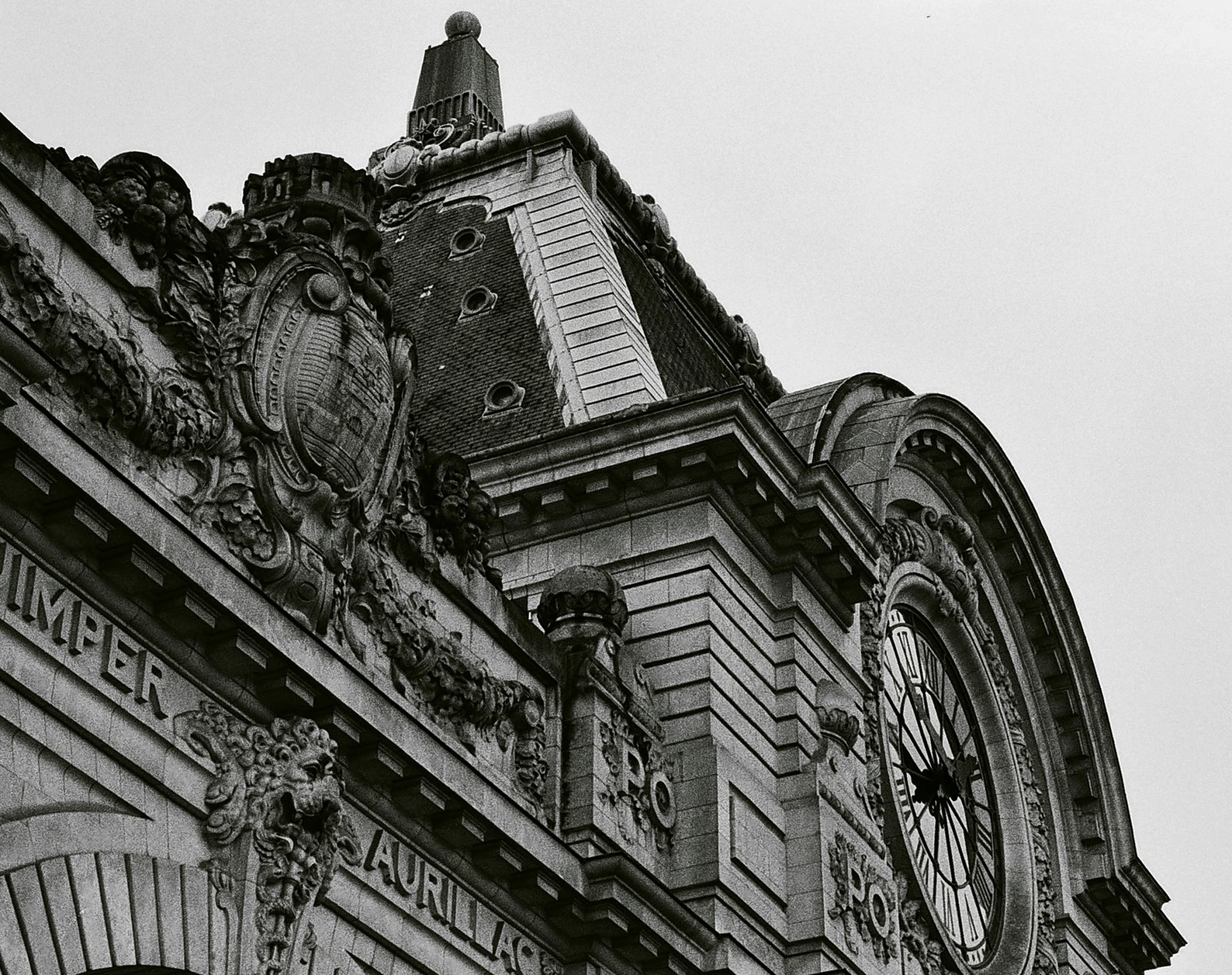 a very tall building with a clock on it's side