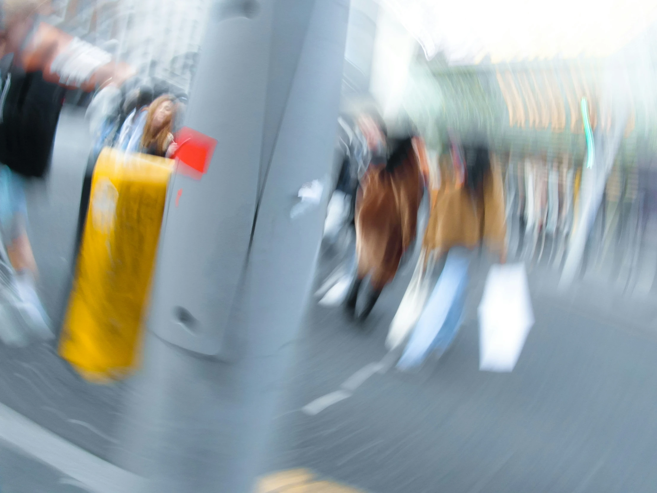 a blurred po of people walking around