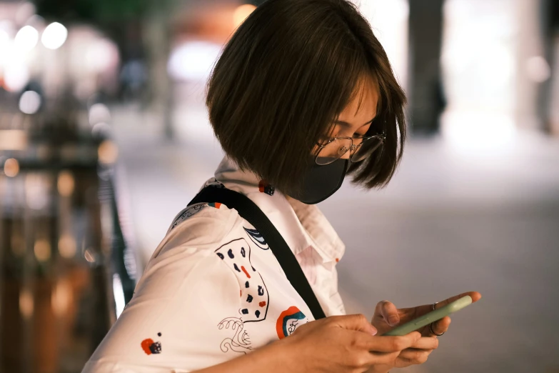 a person with a face mask and headphones on