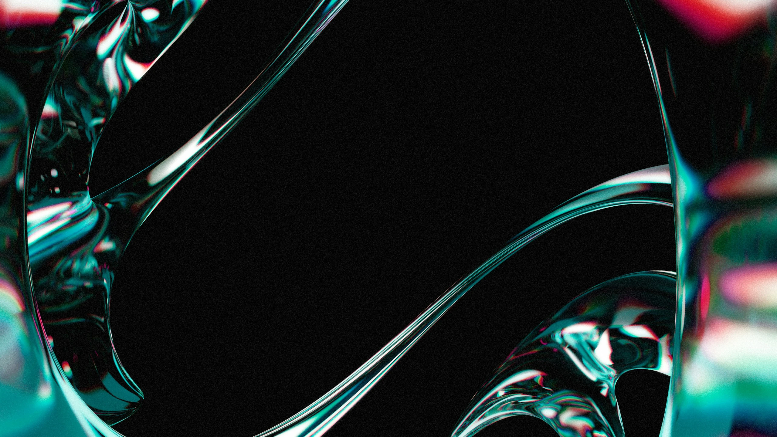 a pograph of some shiny glass on a dark background