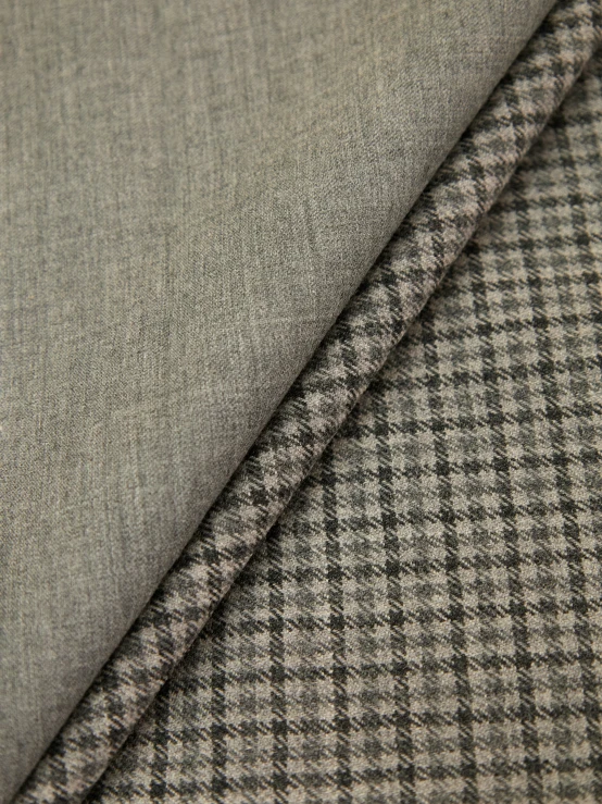 a pile of fabric with a check pattern