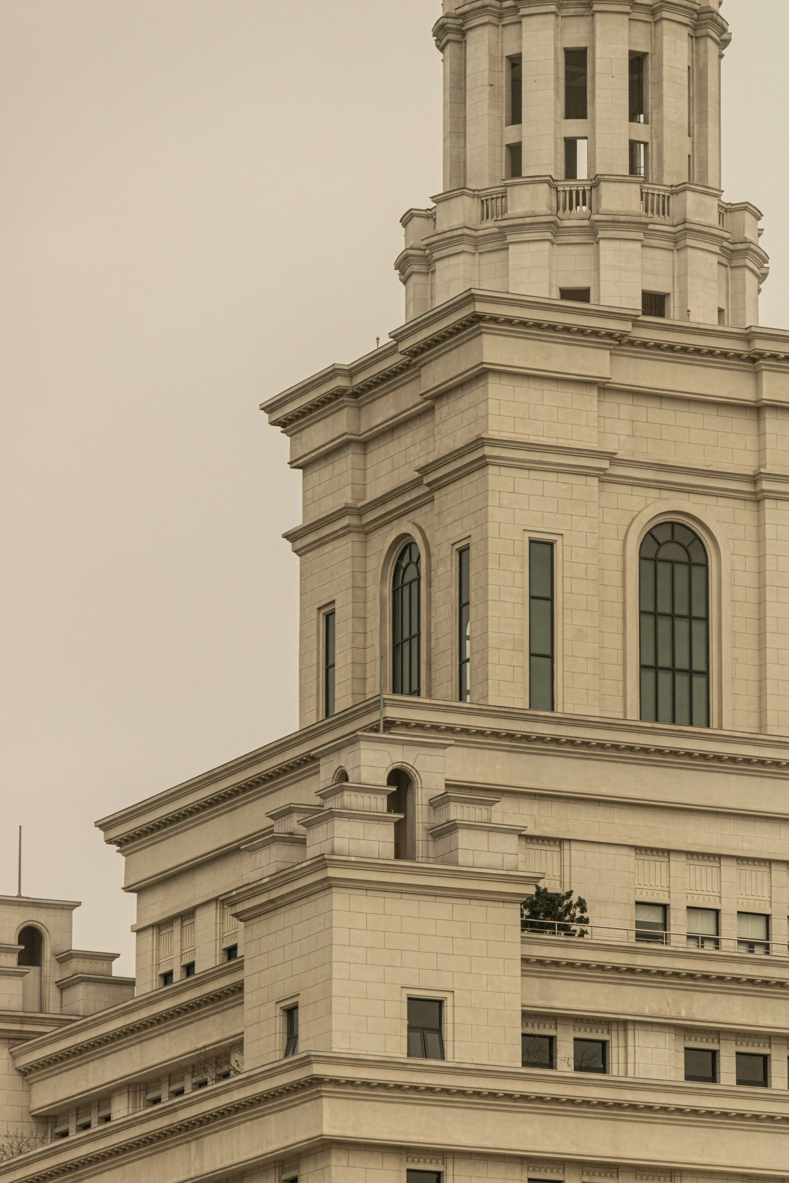 a large building with a sky line next to it