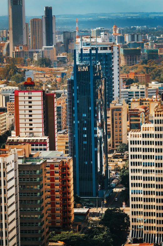 a view of skyscrs in a city from above