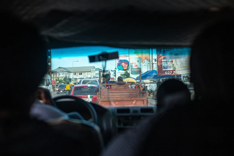 the view from inside a vehicle looking at traffic