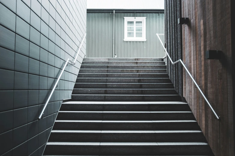 some steps next to a building and wall