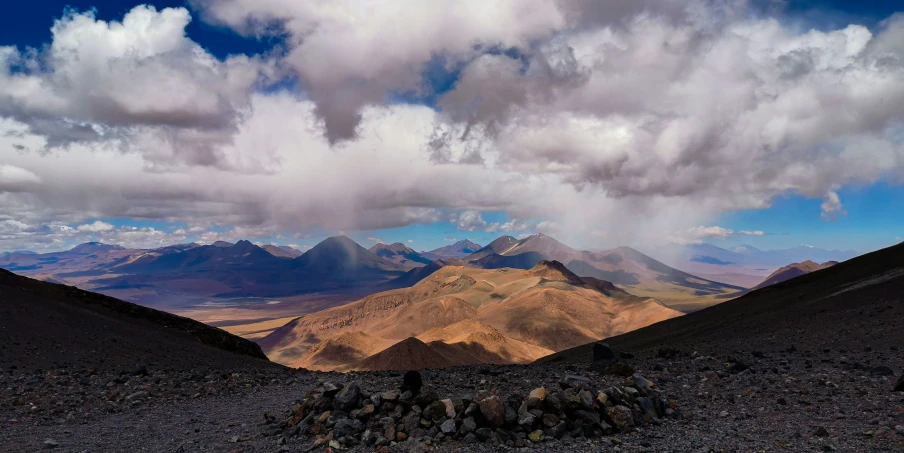 a bunch of hills and mountains that are on the horizon