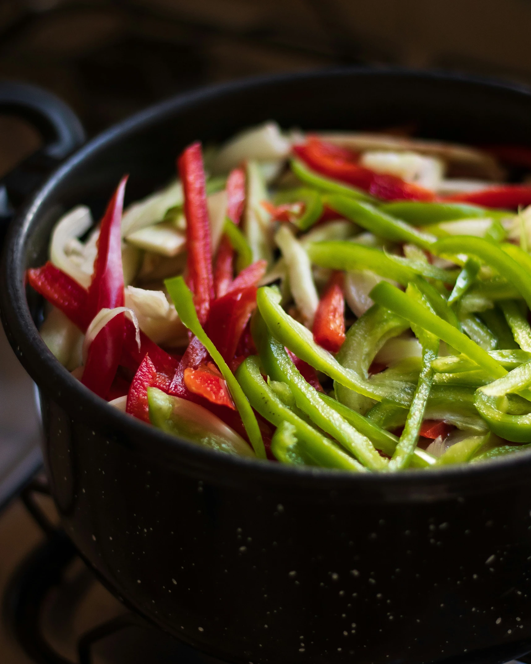 a set full of green beans and red onions