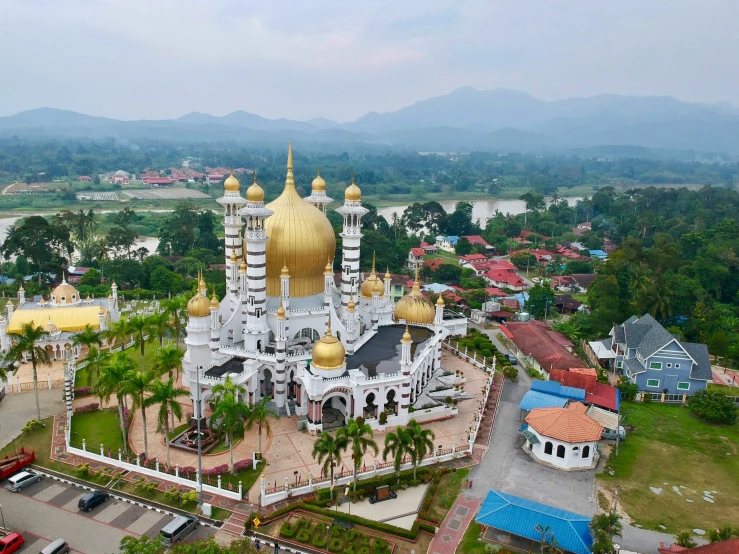 an aerial view of the golden cupola on this beautiful church