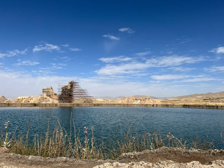 an image of the water with mountains in the background