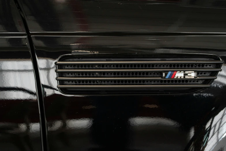 the front grill of a black bmw car