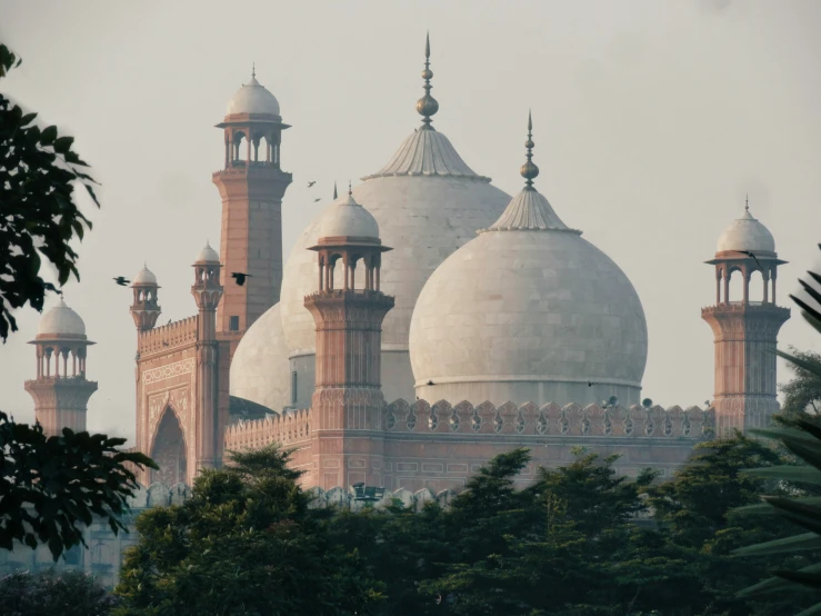 a picture taken from below looking at the roof and domes