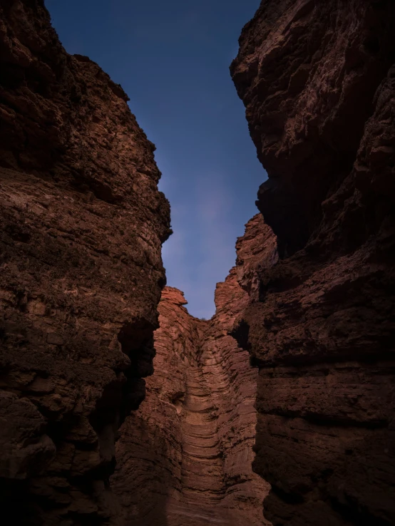 a view of a canyon's steep path in the night