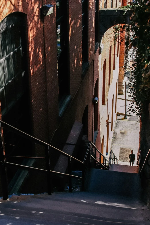 a street that has buildings and steps leading up to the entrance