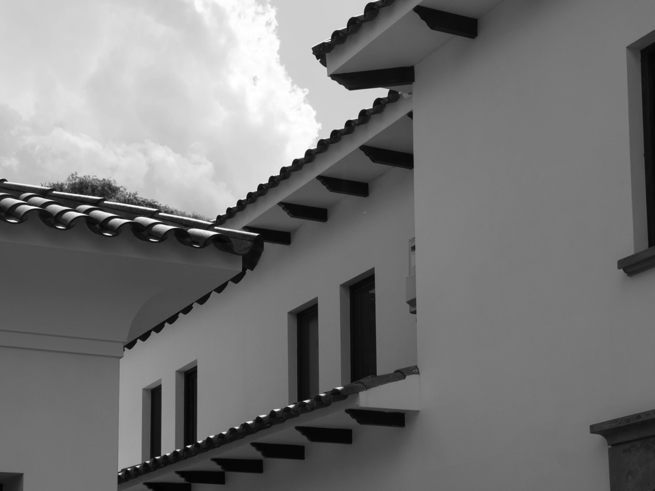 the window on this building look out onto the sky