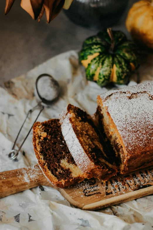 sliced cake and pastry sitting on a table