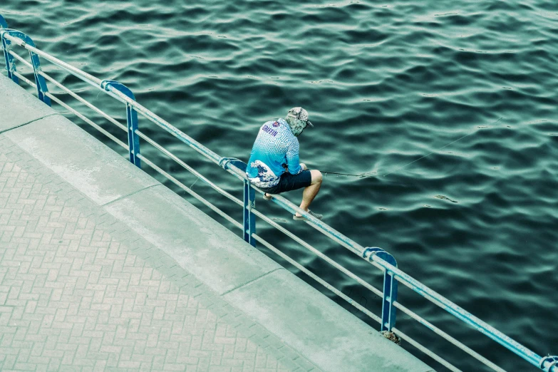 a person that is walking up a bridge