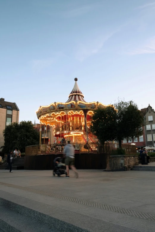 an older carousel at sunset as the sun goes down