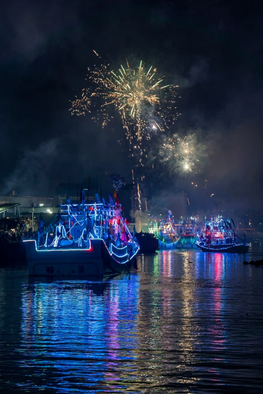 a boat that has fireworks on top of it