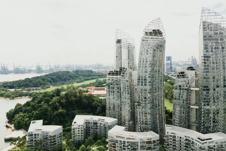 large building made of many different materials in the foreground