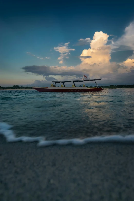 a boat traveling down a body of water