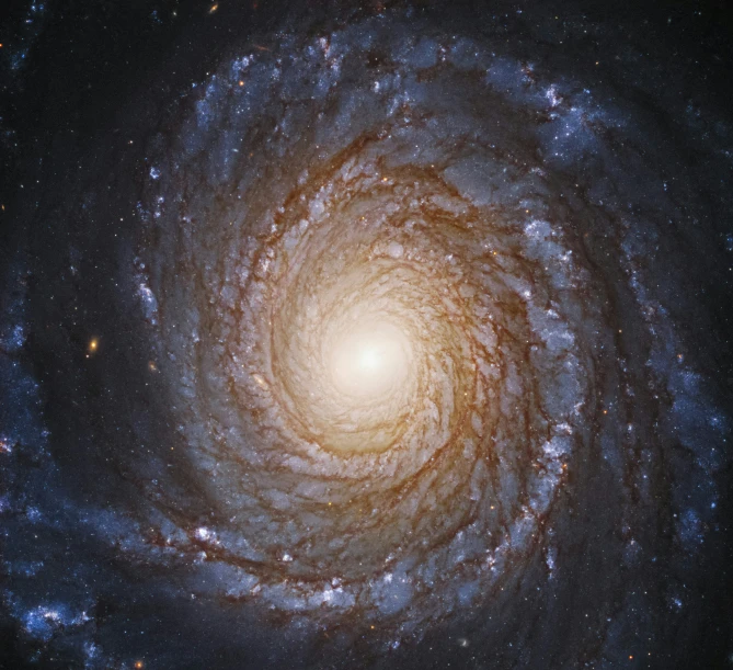 the very large spiral galaxy is pographed from the center