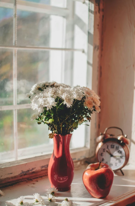 a vase full of flowers on a table