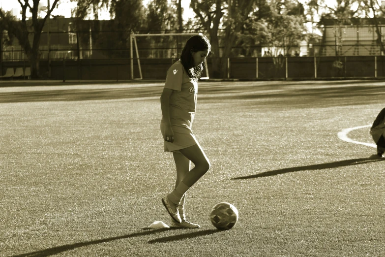 a person on a soccer field with a ball