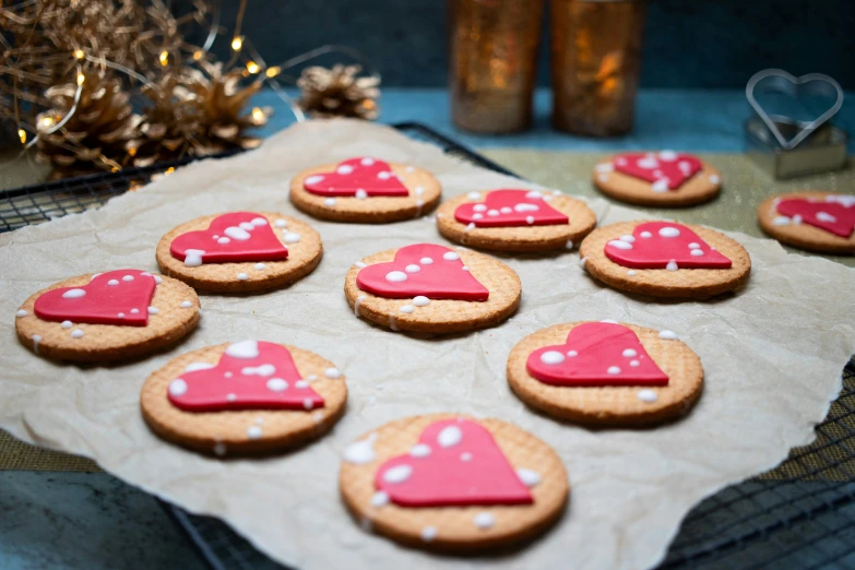 several cookies are decorated with pink polka dots
